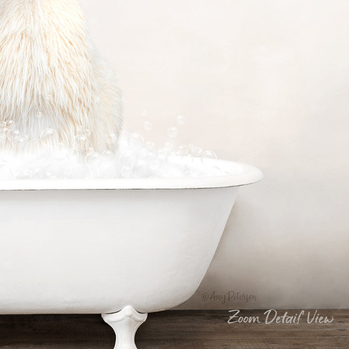 A fluffy white dog is sitting in a white bathtub filled with bubbles, creating a cozy and relaxing scene.