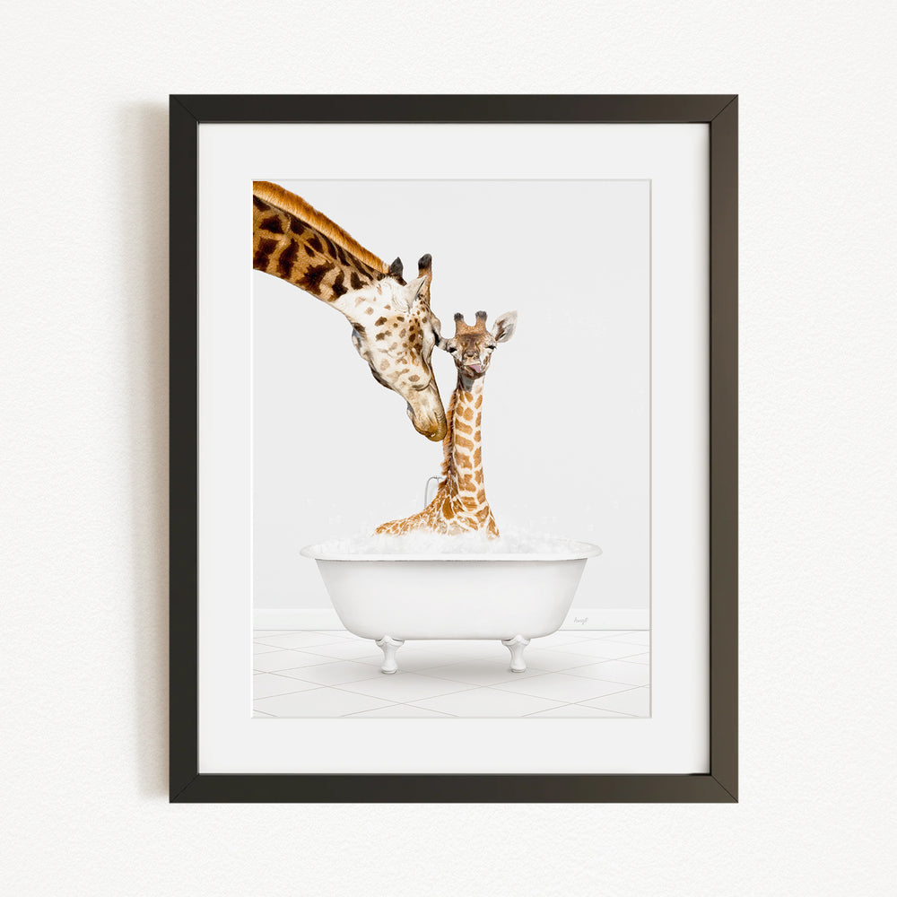 A mother giraffe and her baby giraffe enjoying a bath together in a white bathtub.