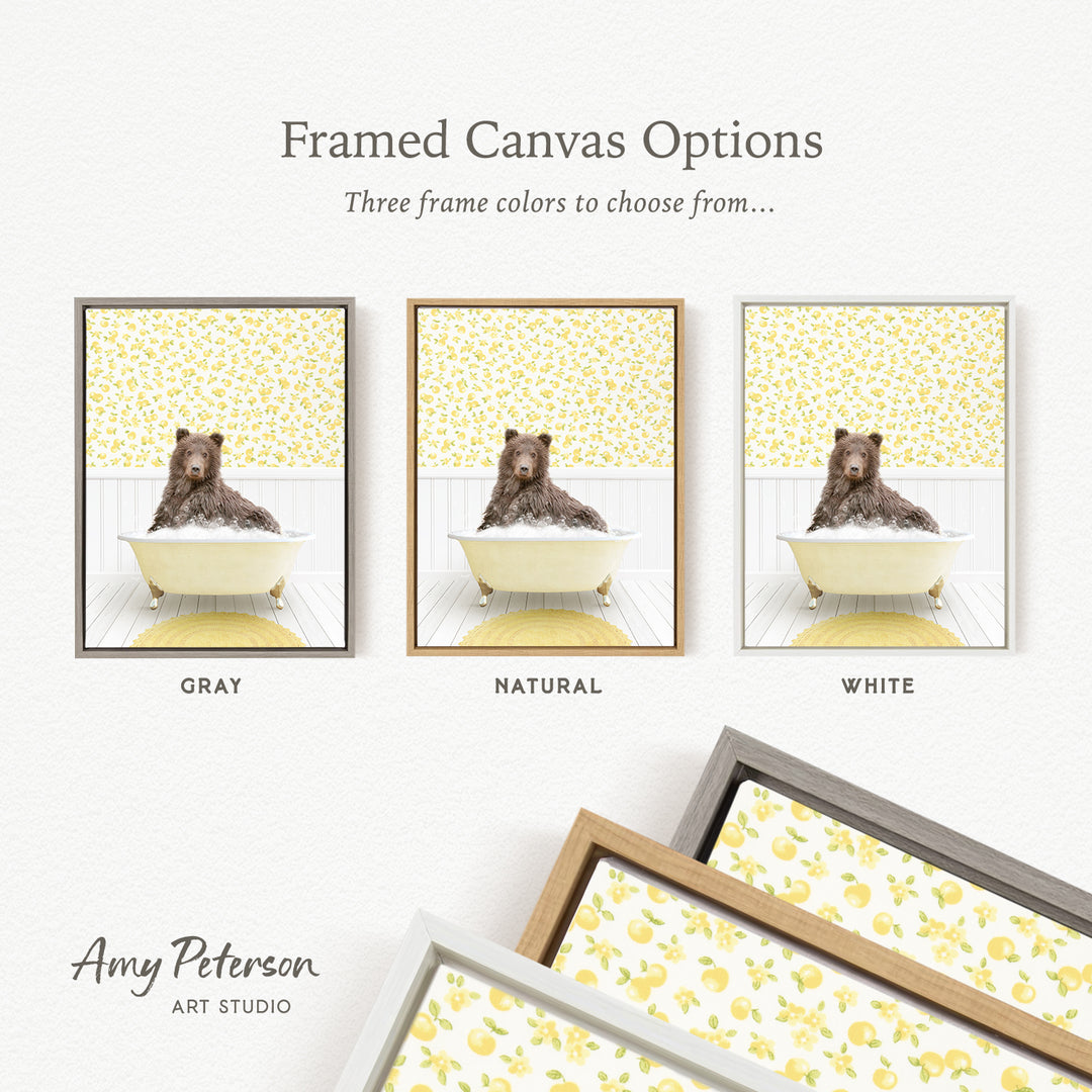 The image is a framed canvas option featuring three different framed pictures of a bear sitting in a bathtub, each with a different frame color: gray, natural, and white.