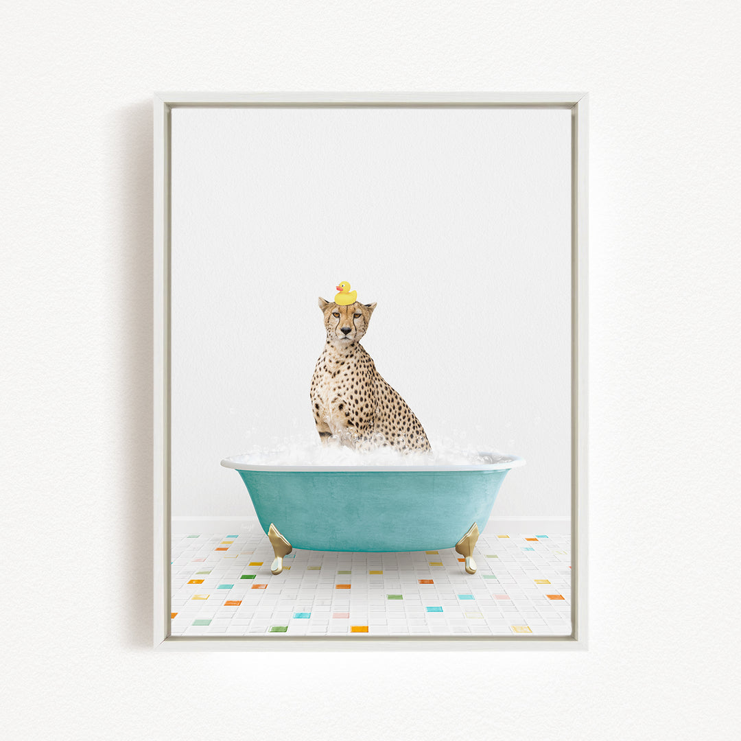 A cheetah wearing a yellow rubber duck hat is sitting in a blue bathtub filled with water, surrounded by a colorful tiled floor.
