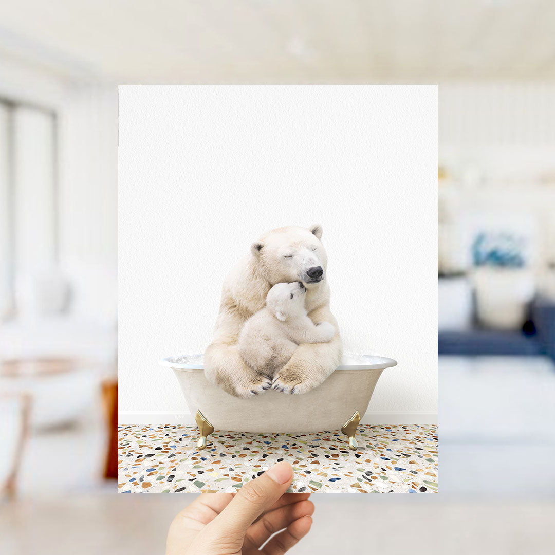 A polar bear and its cub sitting together in a bathtub, with the polar bear appearing to be hugging the cub.