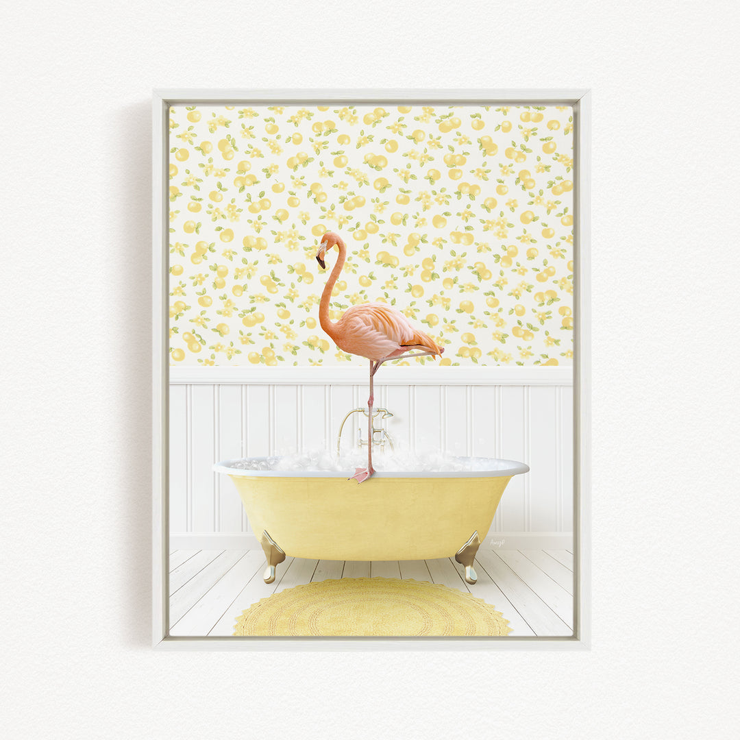 A pink flamingo stands on a yellow bathtub in a bathroom with a yellow and white floral wallpaper.