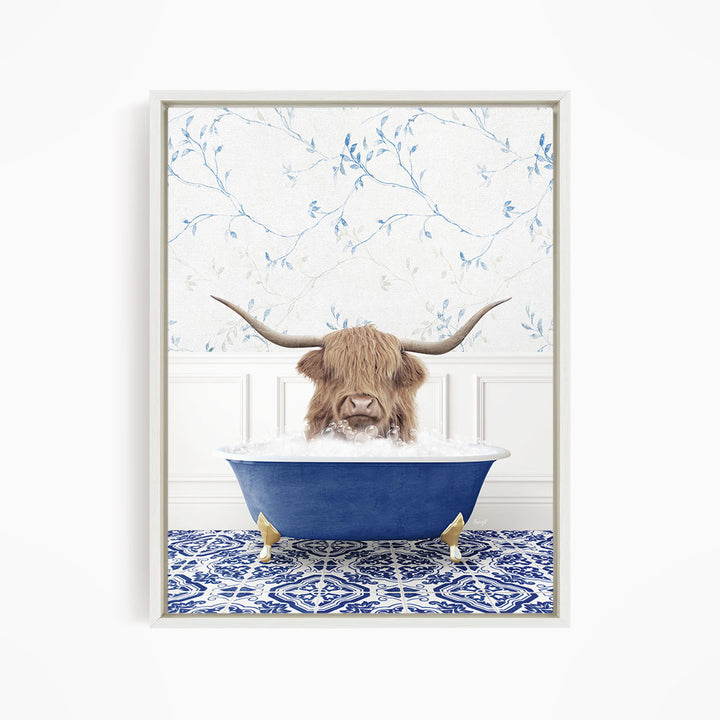 A brown cow with long horns is sitting in a blue bathtub filled with water, surrounded by a blue and white patterned floor.