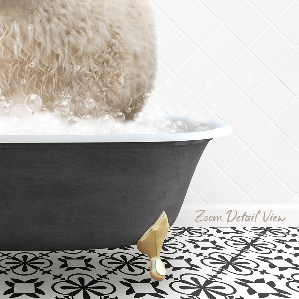 A fluffy white dog is sitting in a bathtub filled with bubbles, with a gold bathtub faucet and a patterned tile floor visible in the background.