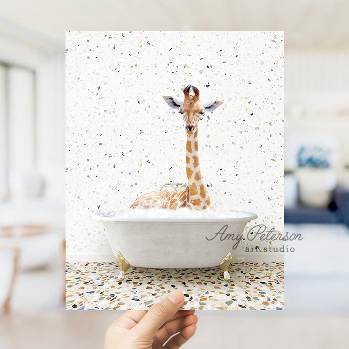 a giraffe is sitting in a bath tub