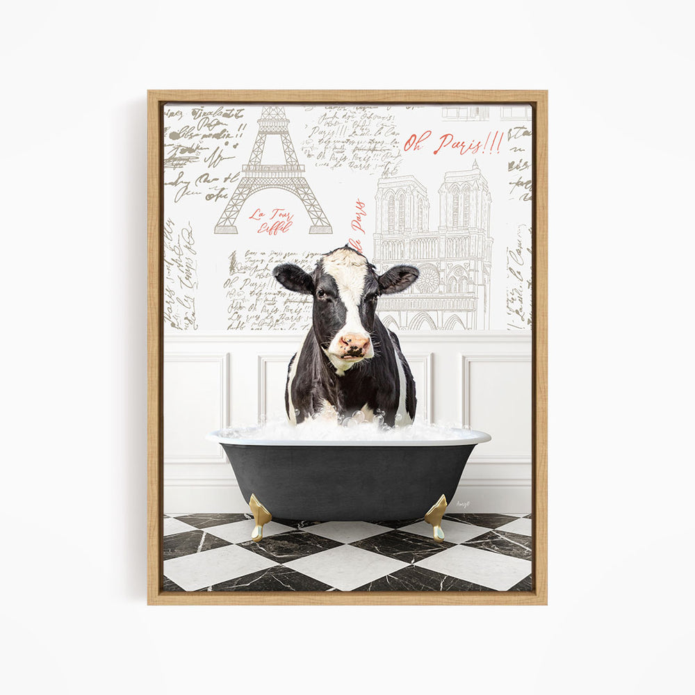 A black and white cow is sitting in a bathtub filled with water, surrounded by a Paris-themed background with the Eiffel Tower and other landmarks.