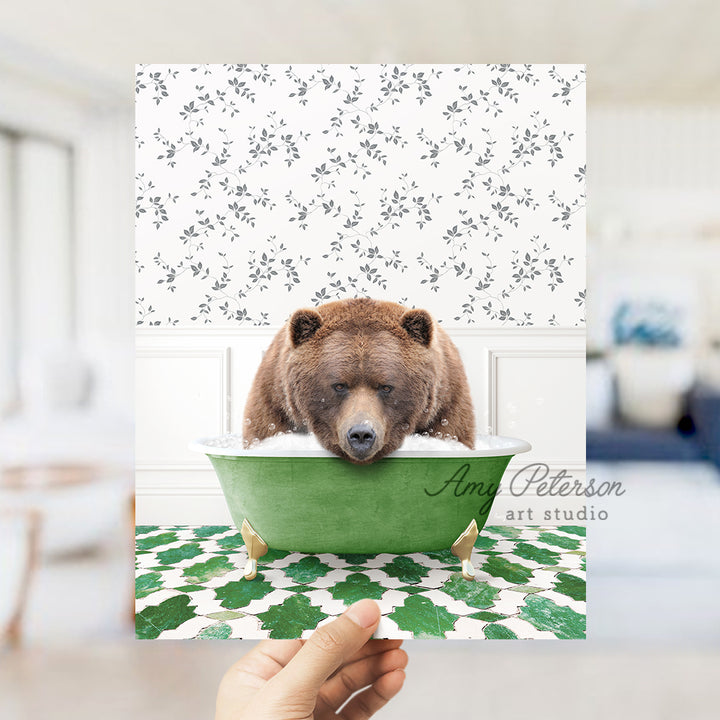 a person holding up a card with a bear in a bathtub