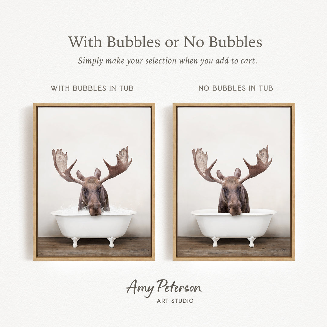 The image is a collage of two framed pictures, each featuring a moose in a bathtub. The moose in the tub has large antlers, and the other moose in the tub does not have antlers. The collage is titled "With Bubbles or No Bubbles" and is created by Amy Peterson from Art Studio.