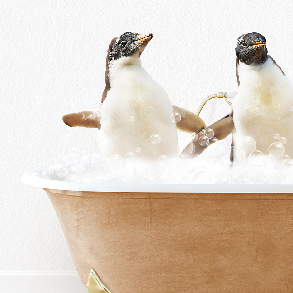 two penguins sitting in a bathtub with bubbles