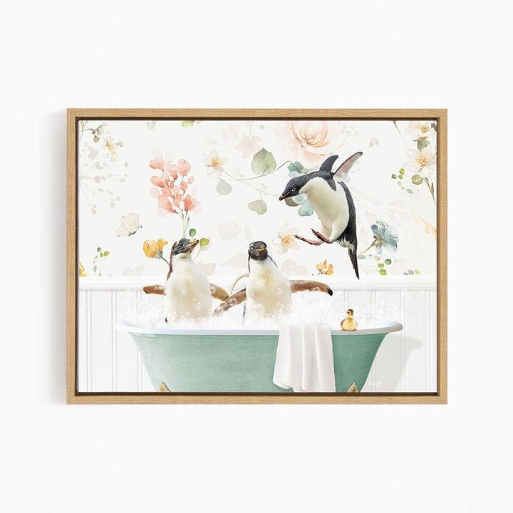 A framed print depicting three penguins sitting in a bathtub, surrounded by flowers and greenery.