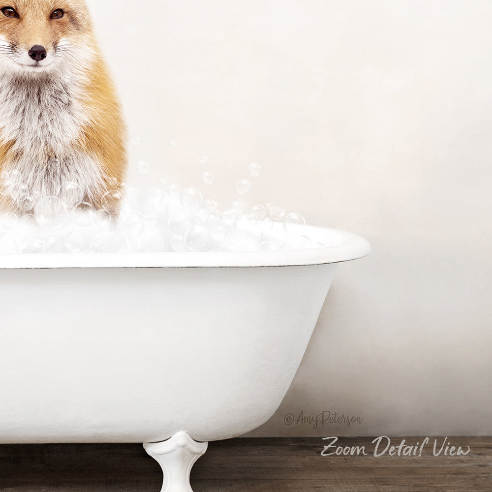 A fox is sitting in a white bathtub filled with bubbles, creating a whimsical and playful scene.