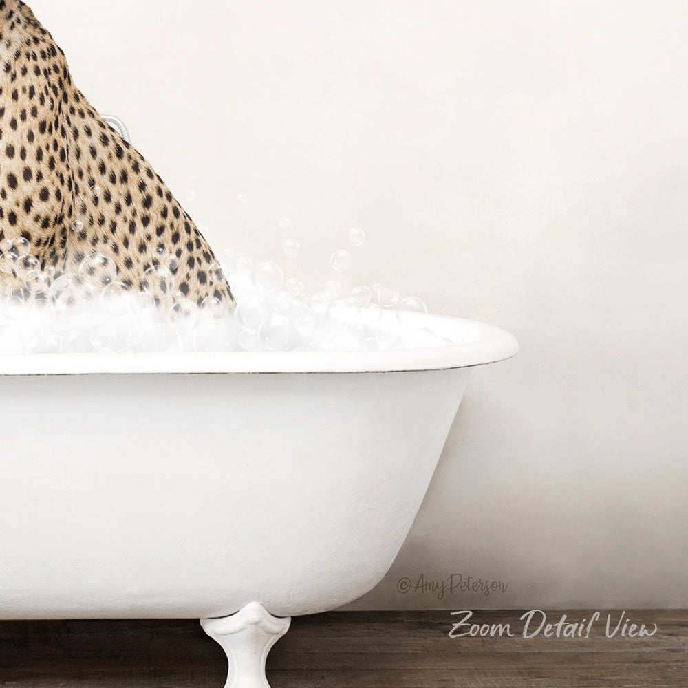 A leopard-print bath mat is placed on a white bathtub, with a cat sitting in the tub and bubbles surrounding it.