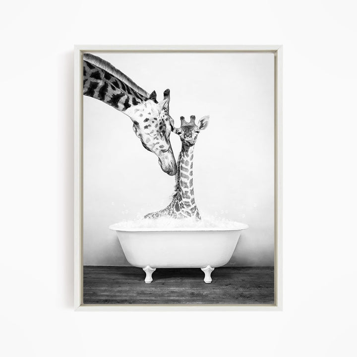 A mother giraffe and her baby giraffe enjoying a bath together in a white bathtub.