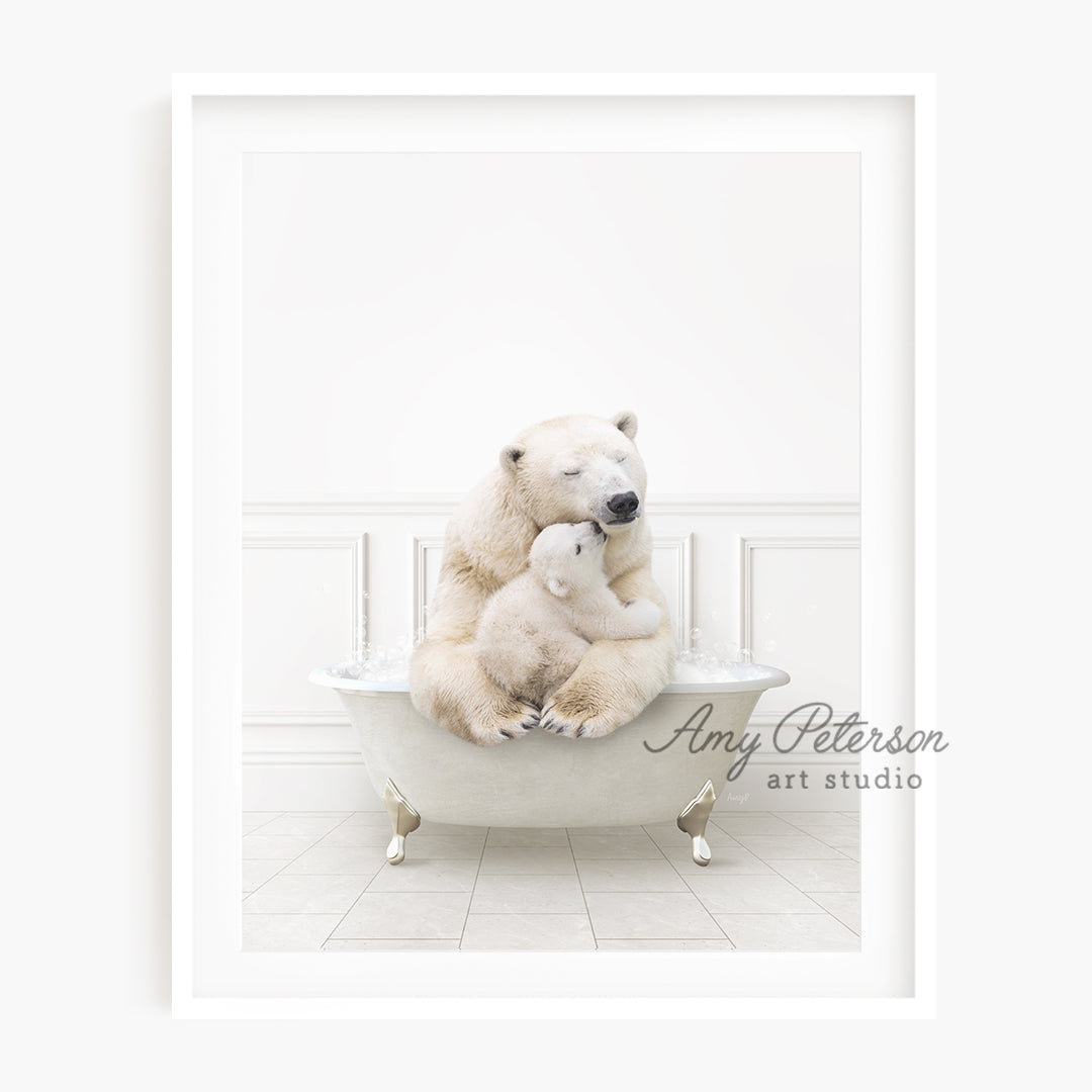 a polar bear and her cub are sitting in a bathtub