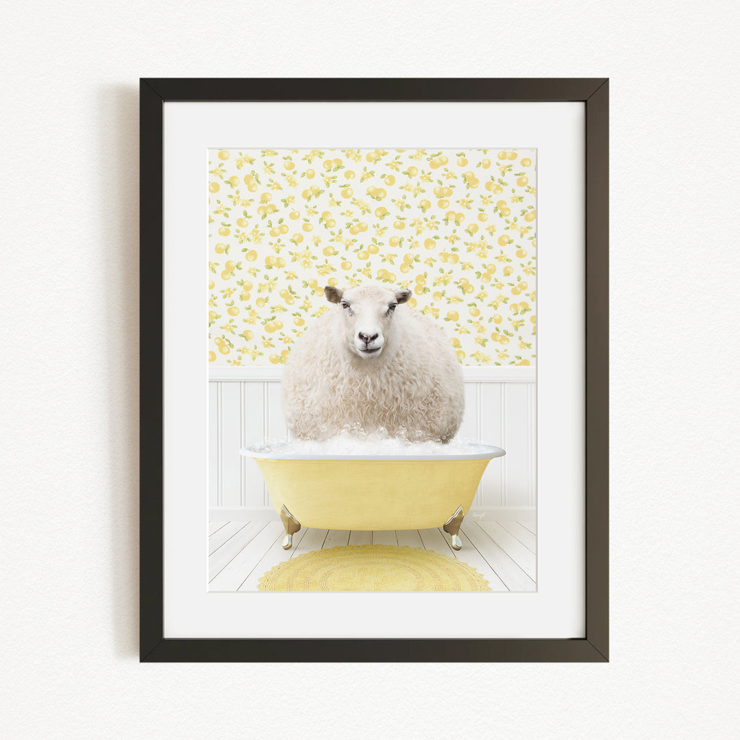 A fluffy white sheep sits in a yellow bathtub, surrounded by a yellow floral wallpaper.