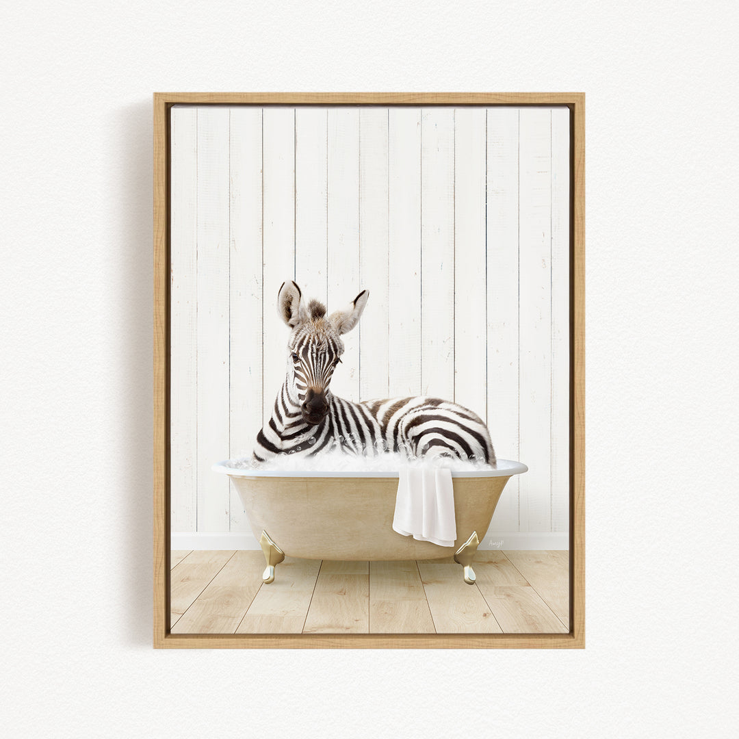 A zebra is sitting in a bathtub, with its head resting on a towel.