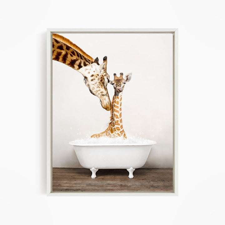 A mother giraffe and her baby giraffe enjoying a bath together in a white bathtub.