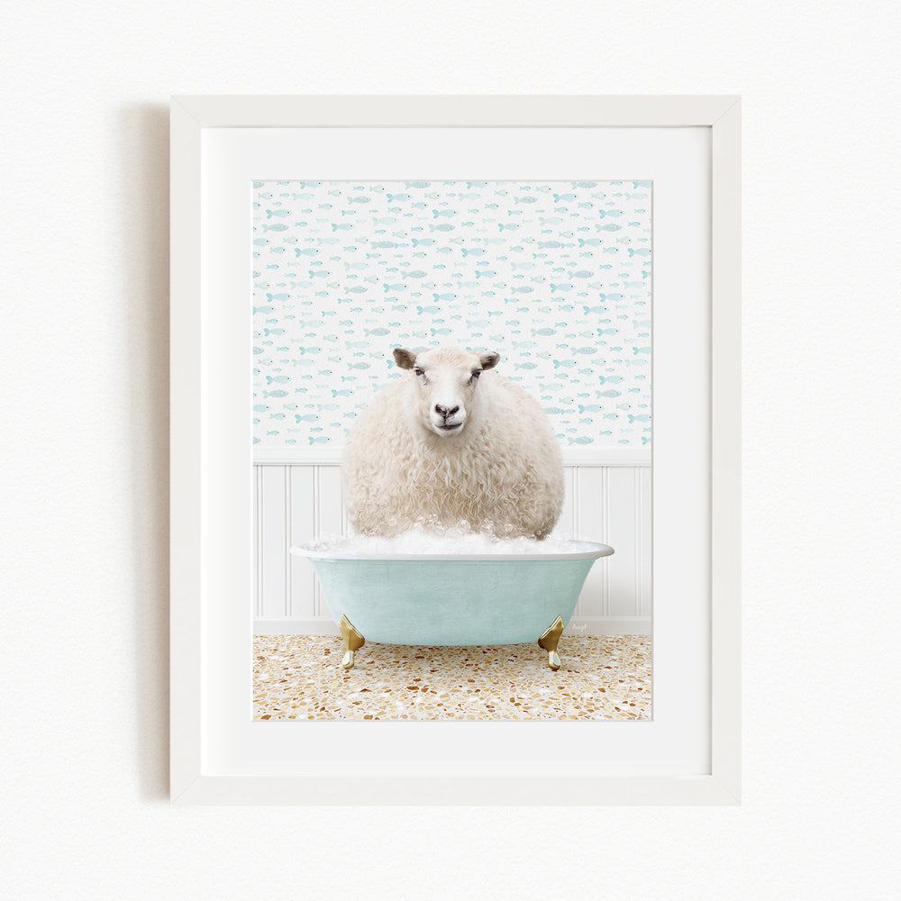 A fluffy white sheep sits in a light blue bathtub, surrounded by a patterned wall and a beige floor.