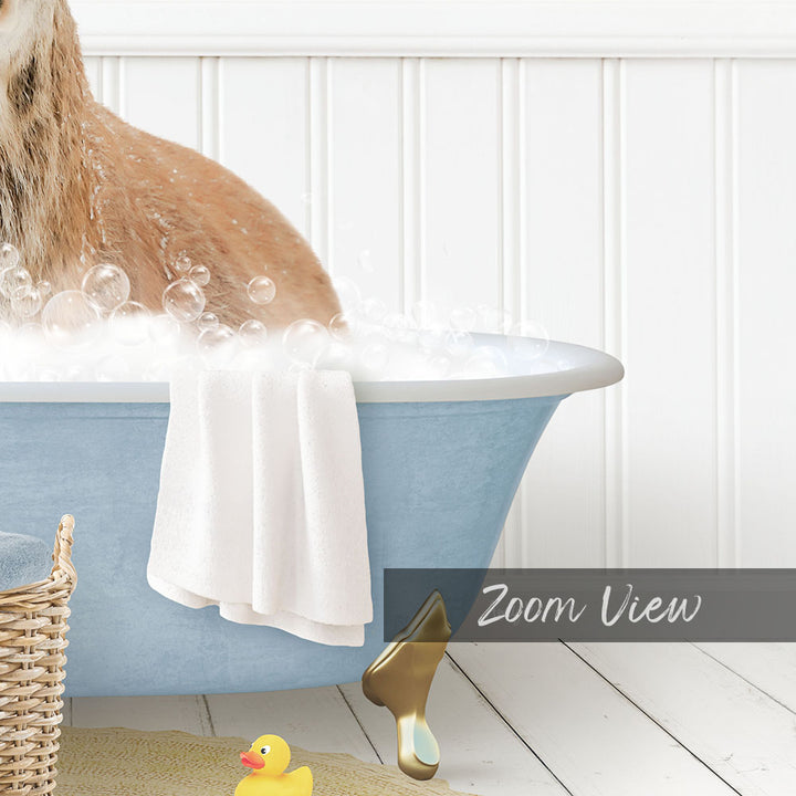A dog is sitting in a blue bathtub filled with bubbles, with a yellow rubber duck nearby.