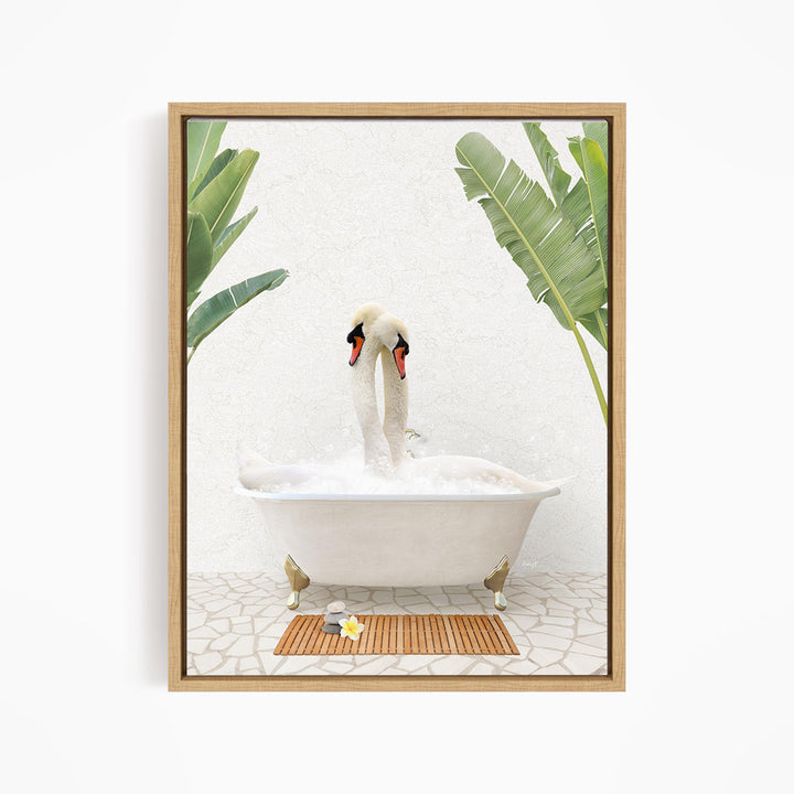 A pair of swans sitting in a white bathtub, surrounded by green leaves, creating a serene and relaxing scene.