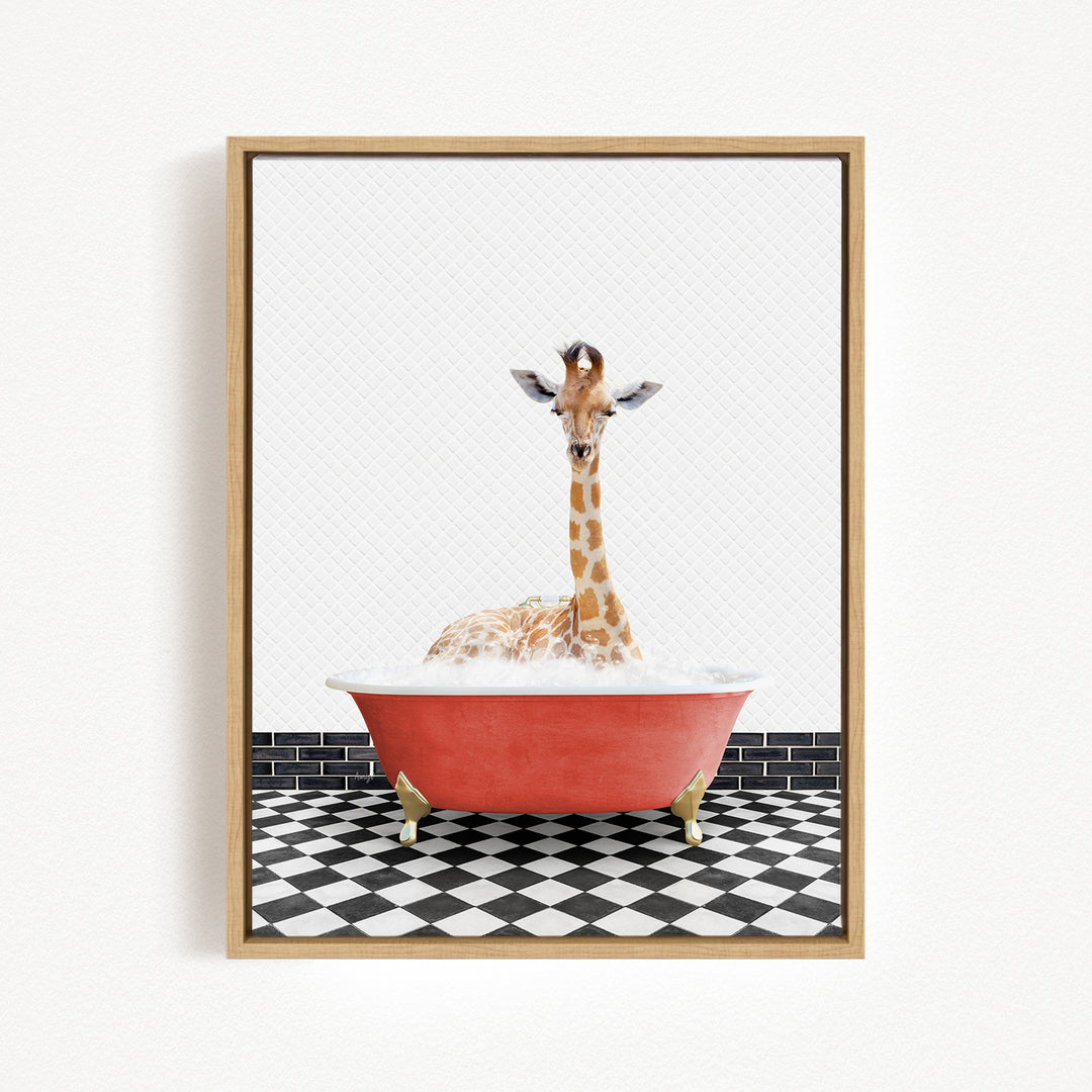 A giraffe sitting in a red bathtub filled with bubbles, surrounded by a black and white checkered floor.