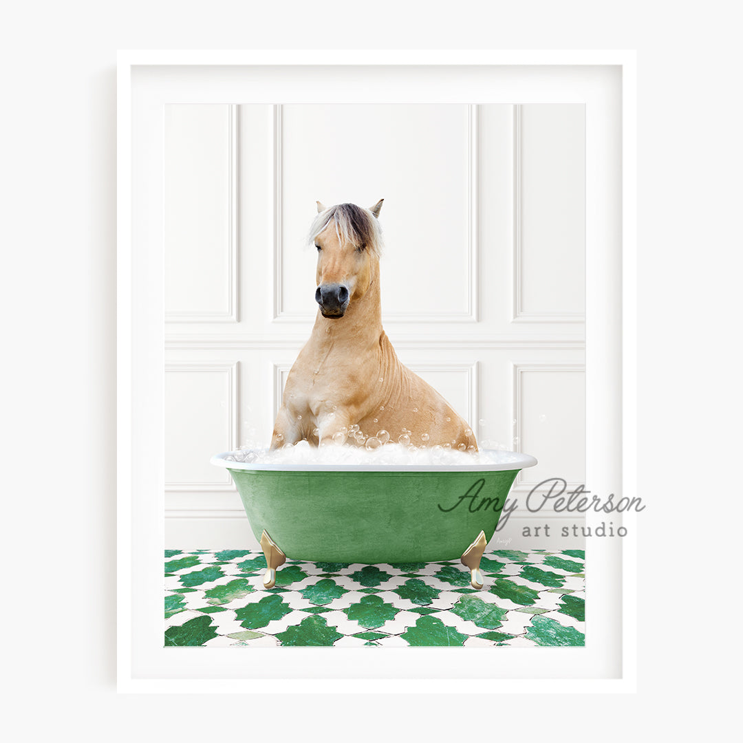 a brown horse sitting in a green bath tub