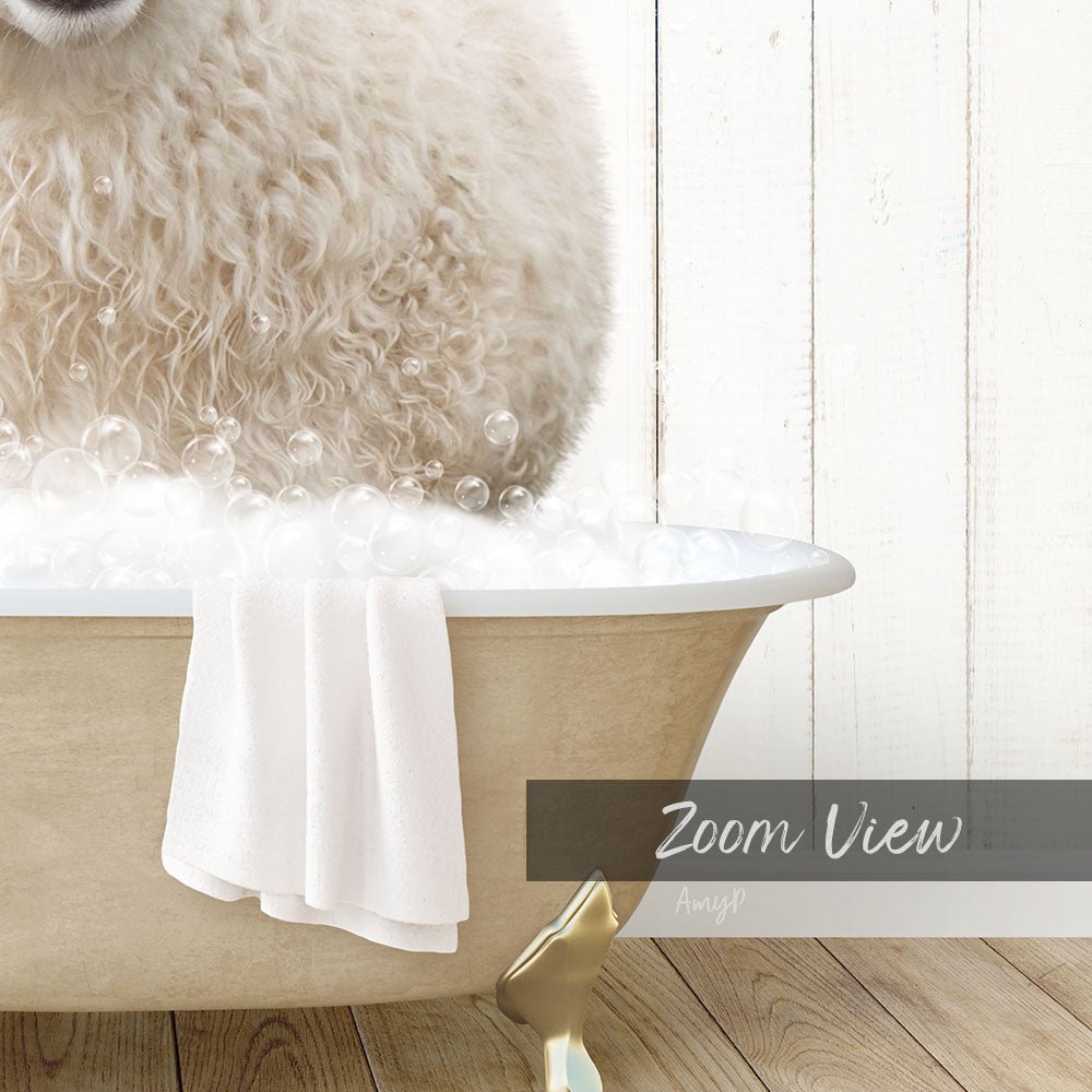 A fluffy white dog is sitting in a bathtub filled with bubbles, with a towel draped over the side and a "Zoom View" label below the image.
