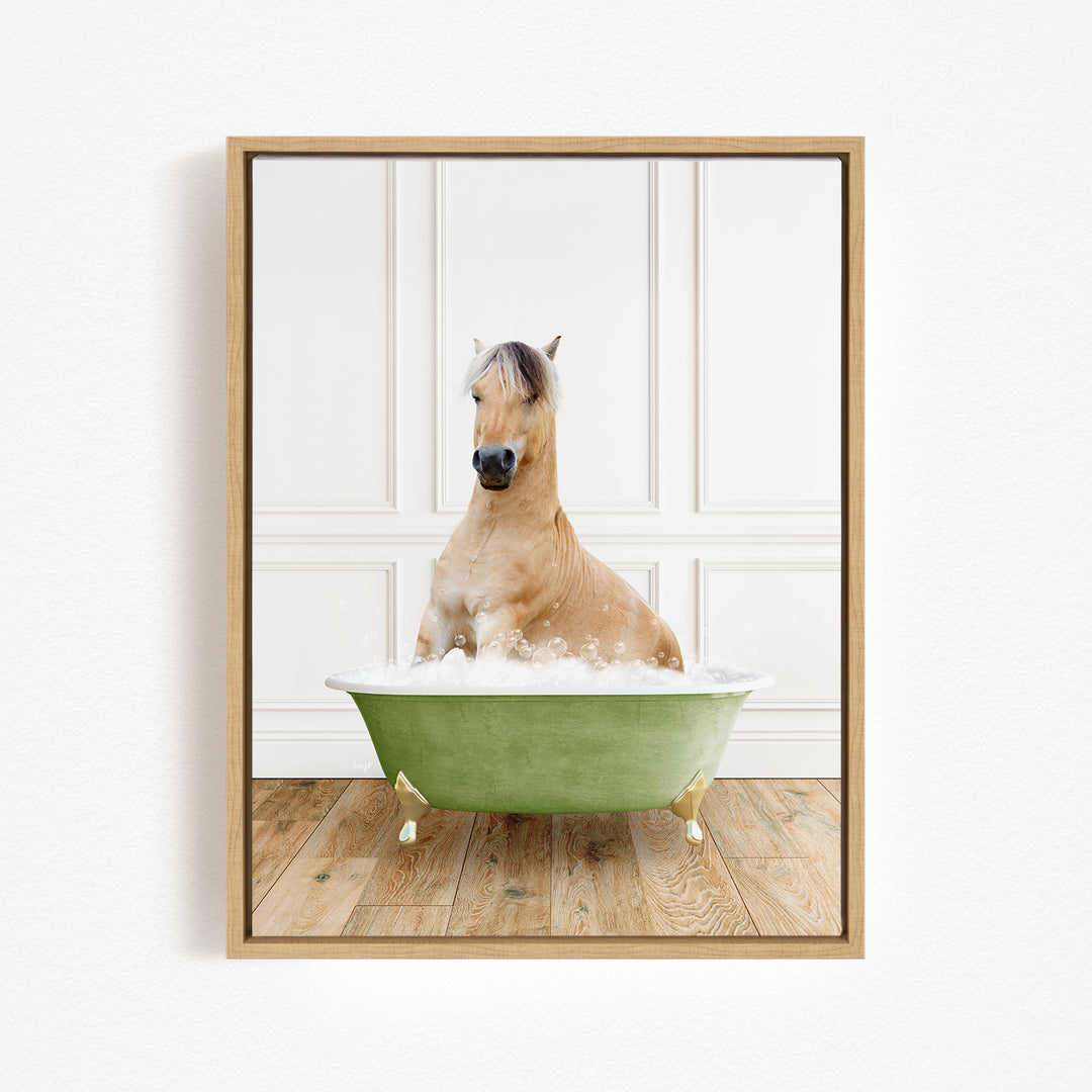 A light brown horse is sitting in a green bathtub filled with water, creating a whimsical and playful scene.
