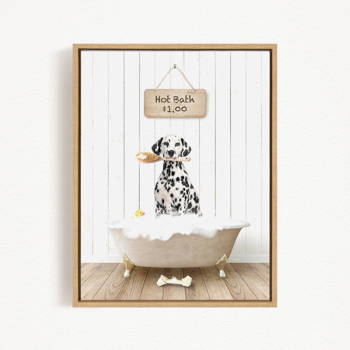 A Dalmatian dog sitting in a white bathtub, holding a toy in its mouth, with a wooden sign above the bathtub that reads "Hot Bath $1.00".