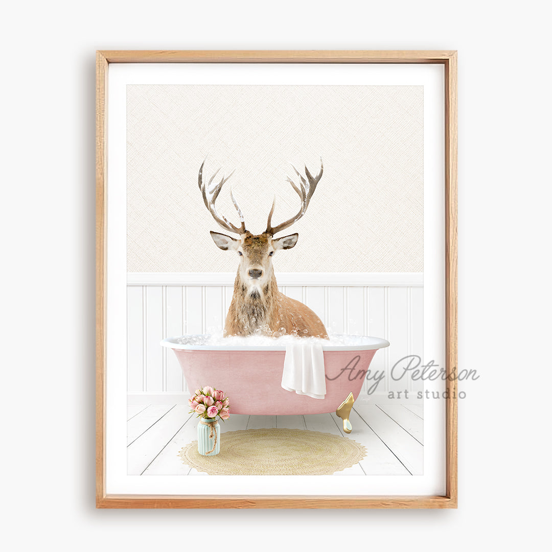 a picture of a deer sitting in a bathtub