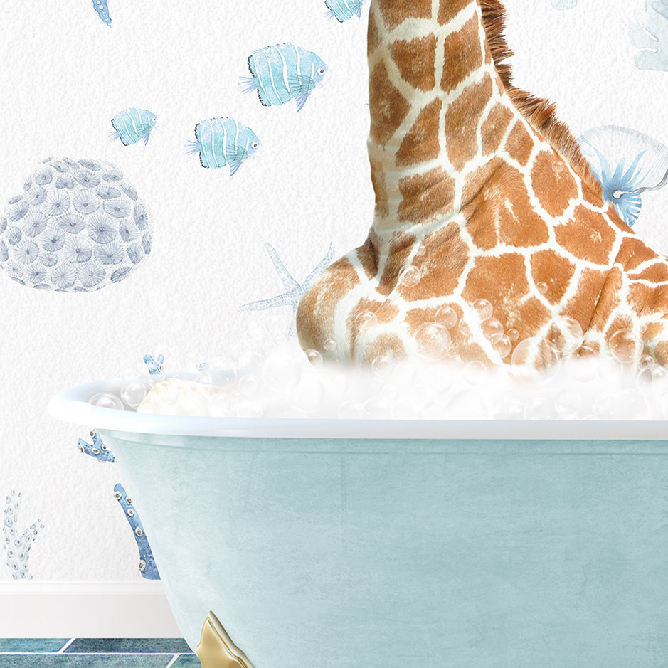 a giraffe is sitting in a bathtub with bubbles