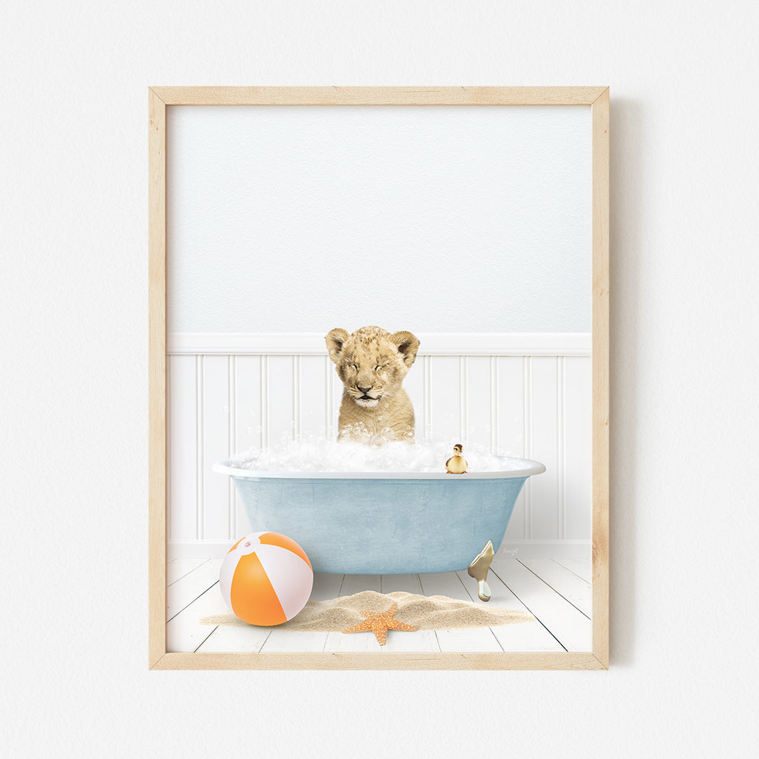 a picture of a baby lion in a bathtub