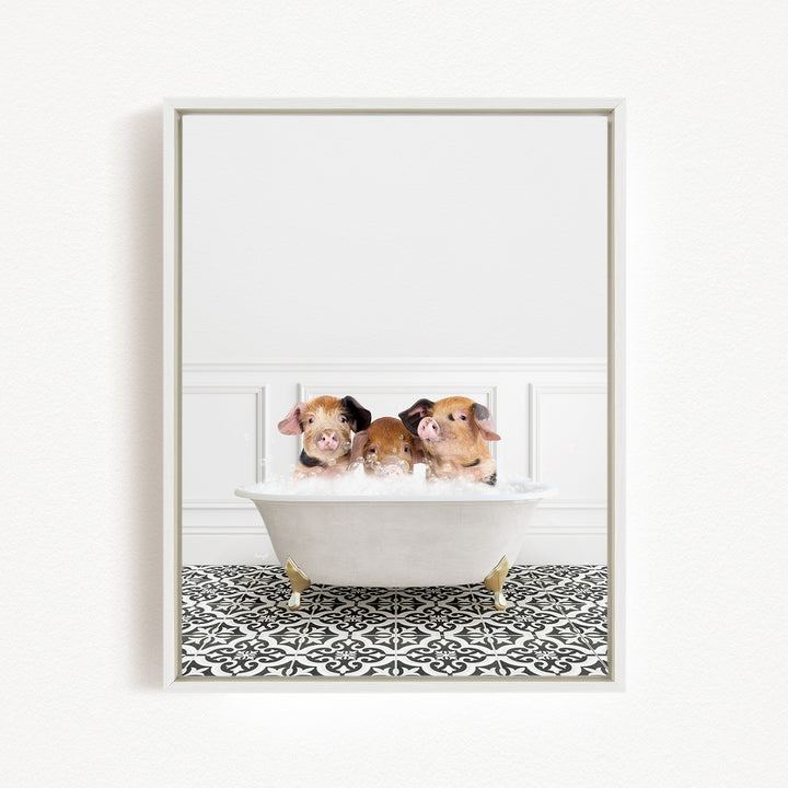 Three adorable pigs sitting in a white bathtub, enjoying a relaxing bath.