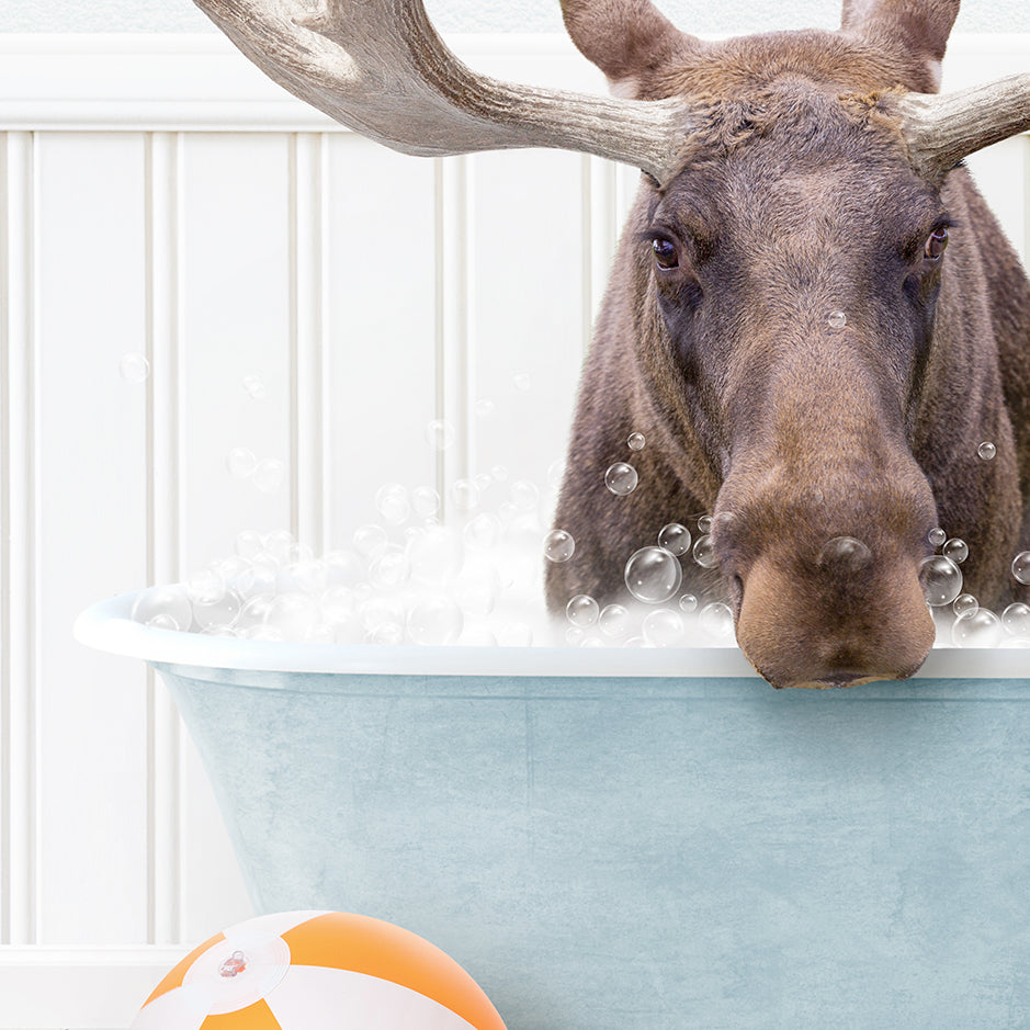 a moose is taking a bath in a bathtub