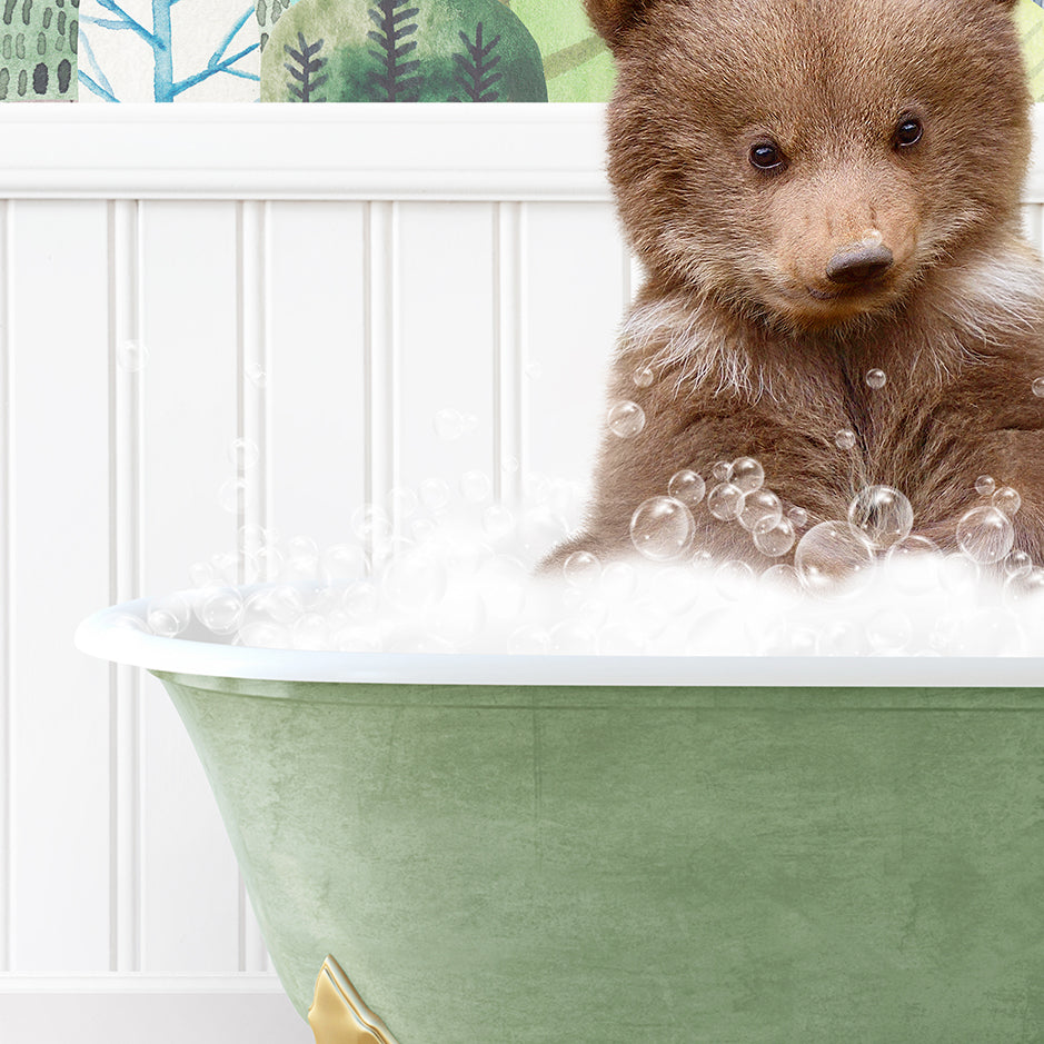 a brown bear sitting in a bath tub filled with bubbles