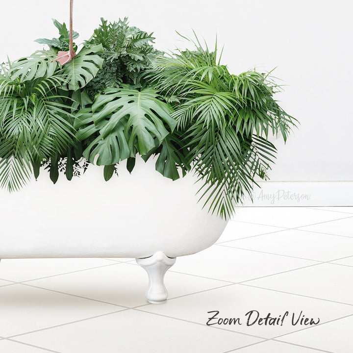 A white bathtub filled with lush green plants, including ferns and other foliage, sits on a tiled floor.