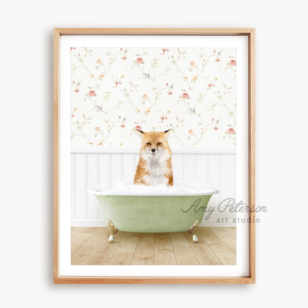 a cat sitting in a bathtub with flowers on the wall behind it