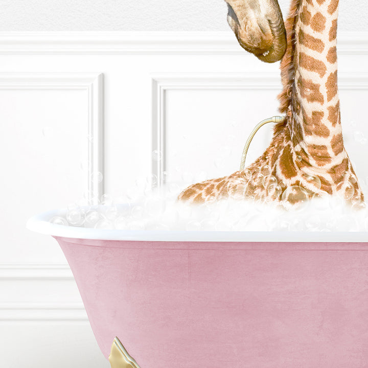 a baby giraffe in a pink bath tub