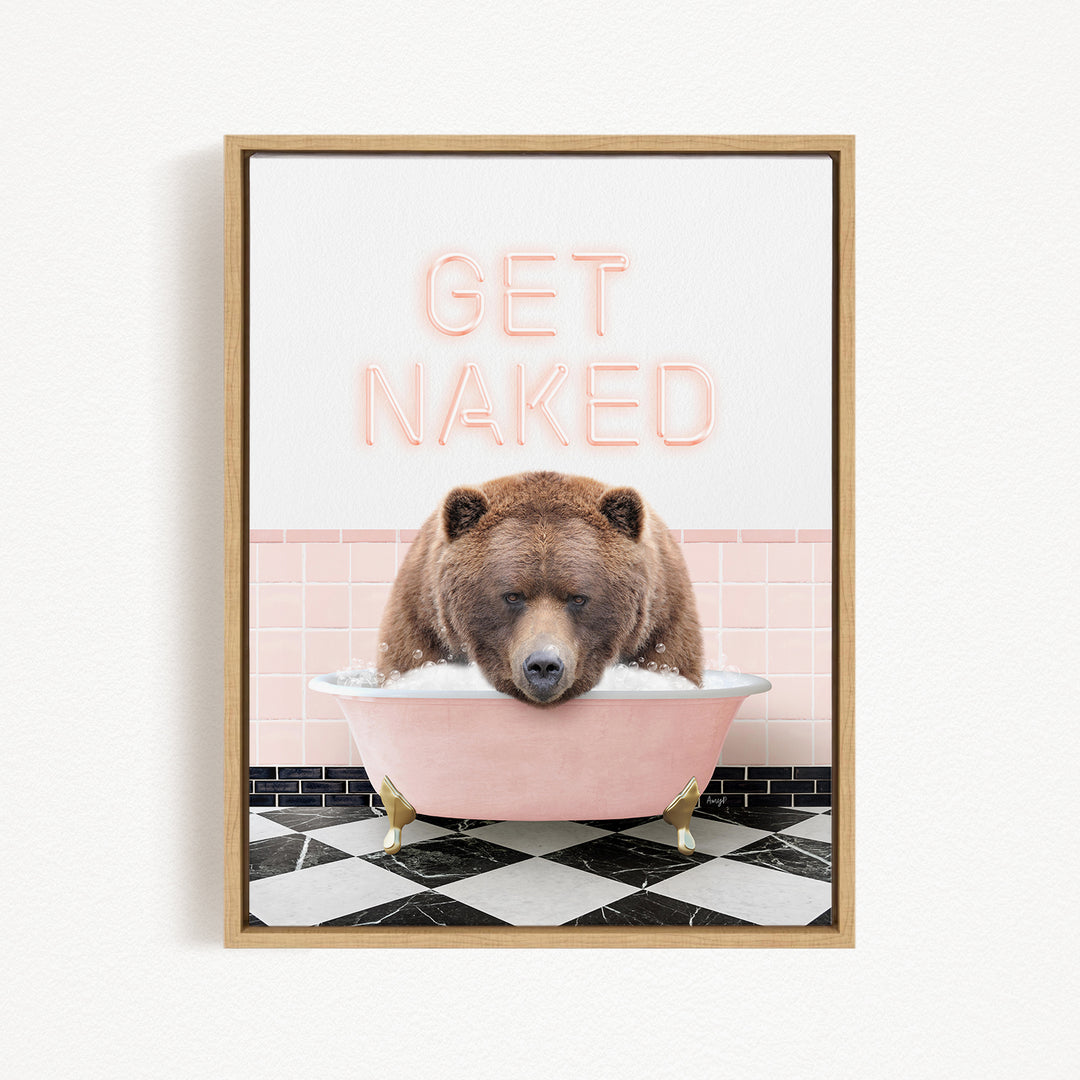 A brown bear sitting in a pink bathtub with the text "GET NAKED" displayed above it.