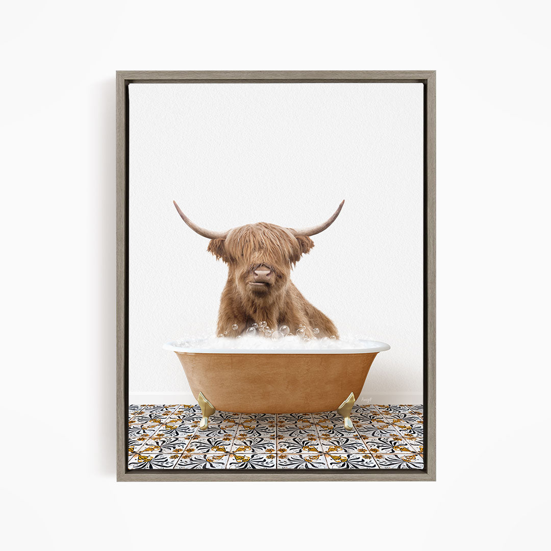 A Highland cow with long horns is sitting in a bathtub filled with water, creating a whimsical and amusing scene.