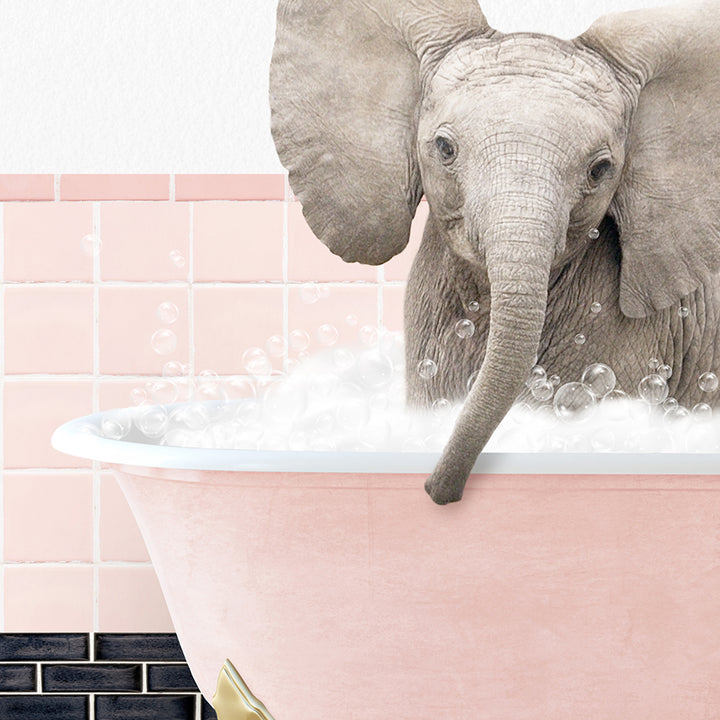 a baby elephant in a bathtub with bubbles