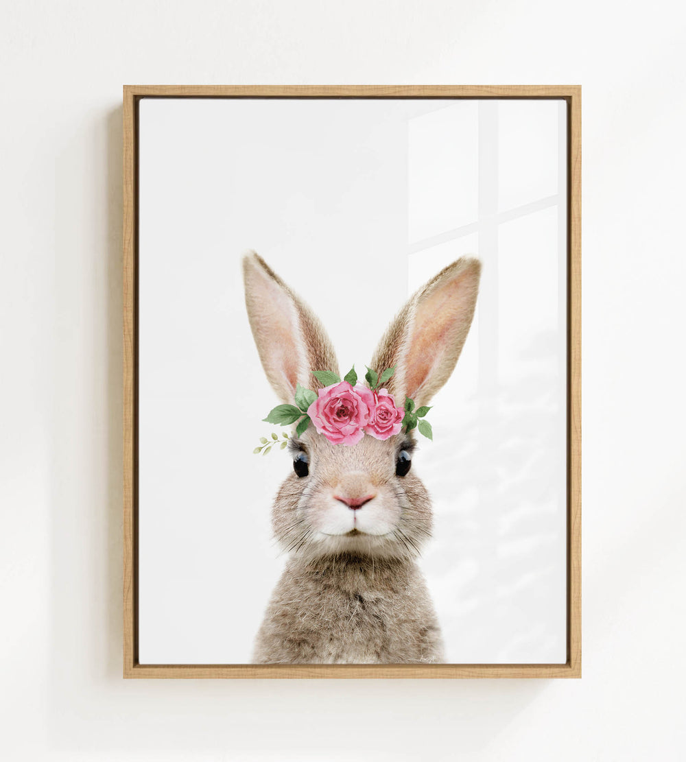 A picture of a rabbit wearing a flower crown on its head.