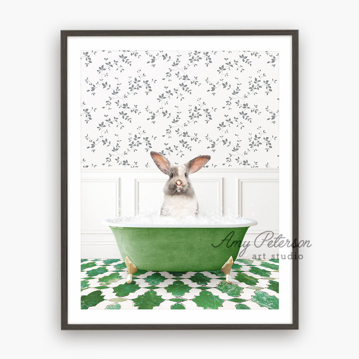 a rabbit sitting in a green bath tub