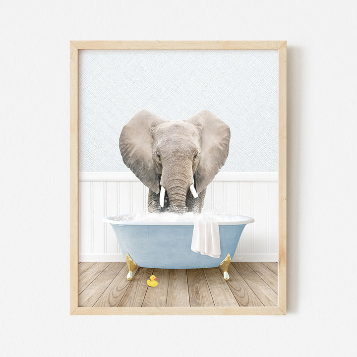 an elephant is taking a bath in a blue bathtub