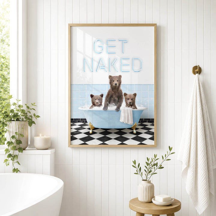 a framed poster with a playful and humorous scene of three bears sitting in a bathtub, with the text "GET NAKED" displayed prominently.