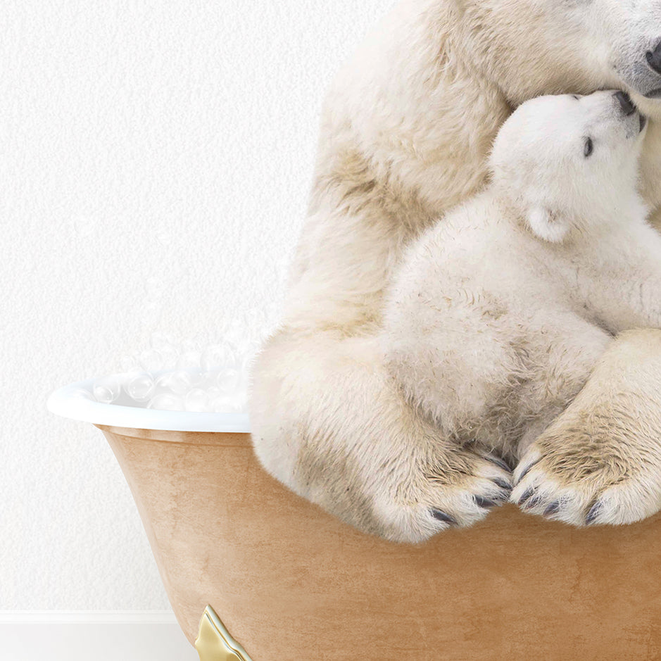 a mother polar bear cuddles her cub in a bathtub