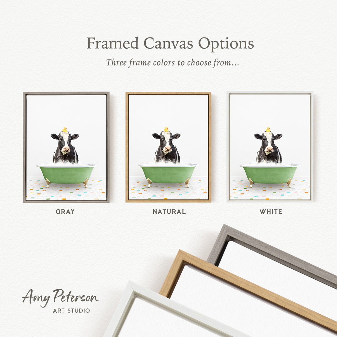 three framed canvas options featuring a cow sitting in a bathtub, each with a different frame color: gray, natural, and white.