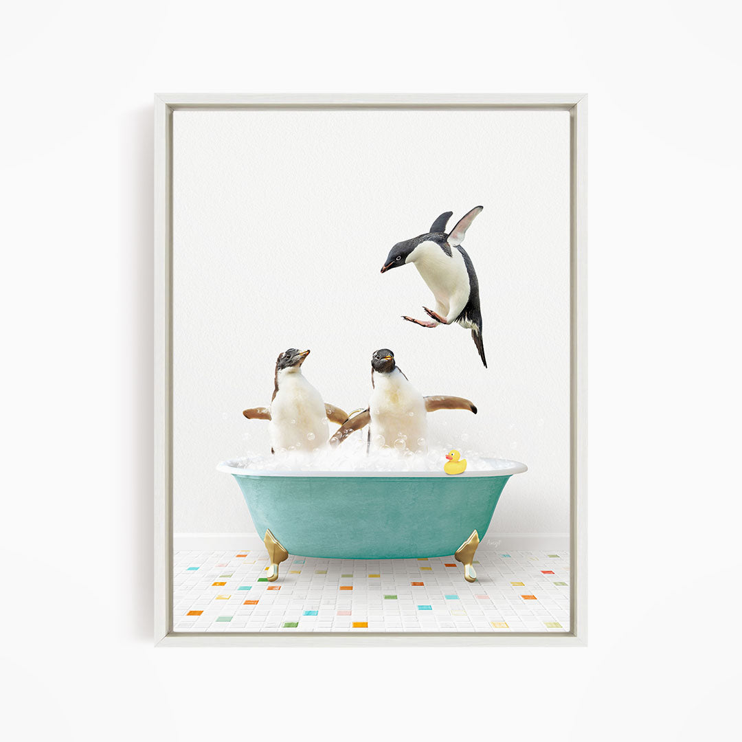 A framed image depicting two penguins sitting in a bathtub, with one penguin flying towards the other penguin.