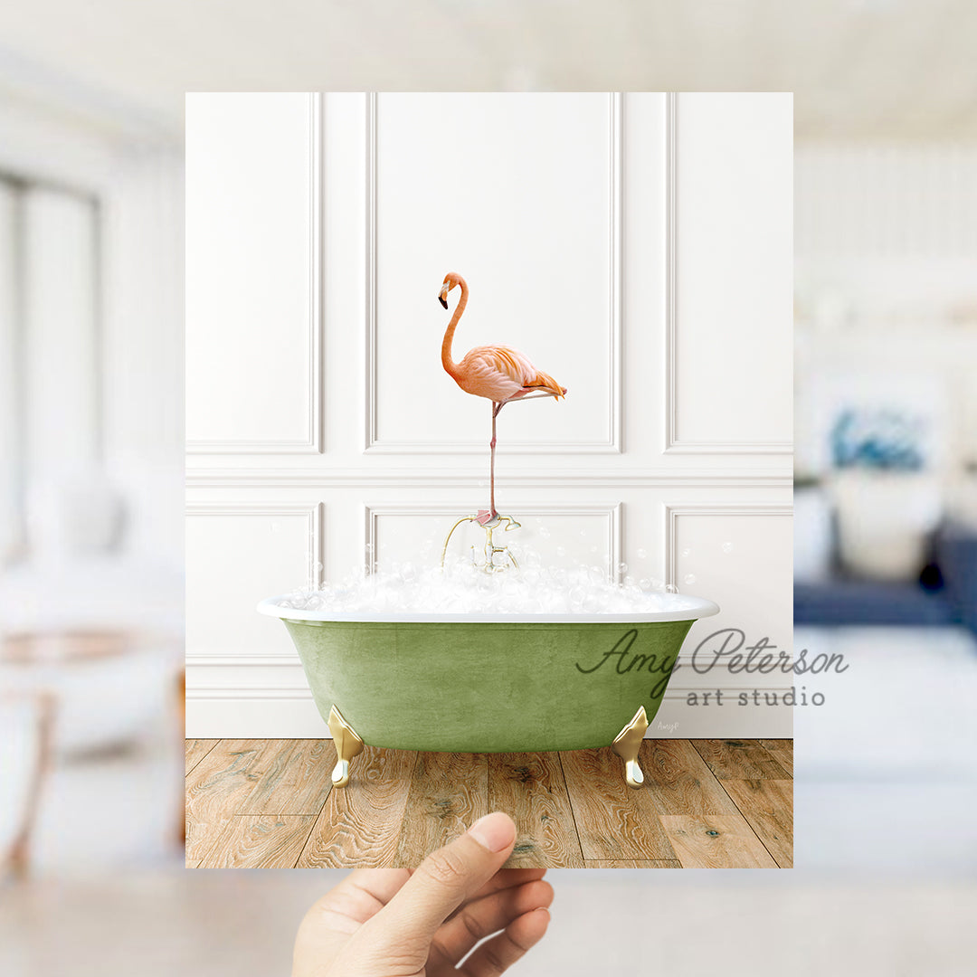 a pink flamingo standing on top of a bath tub