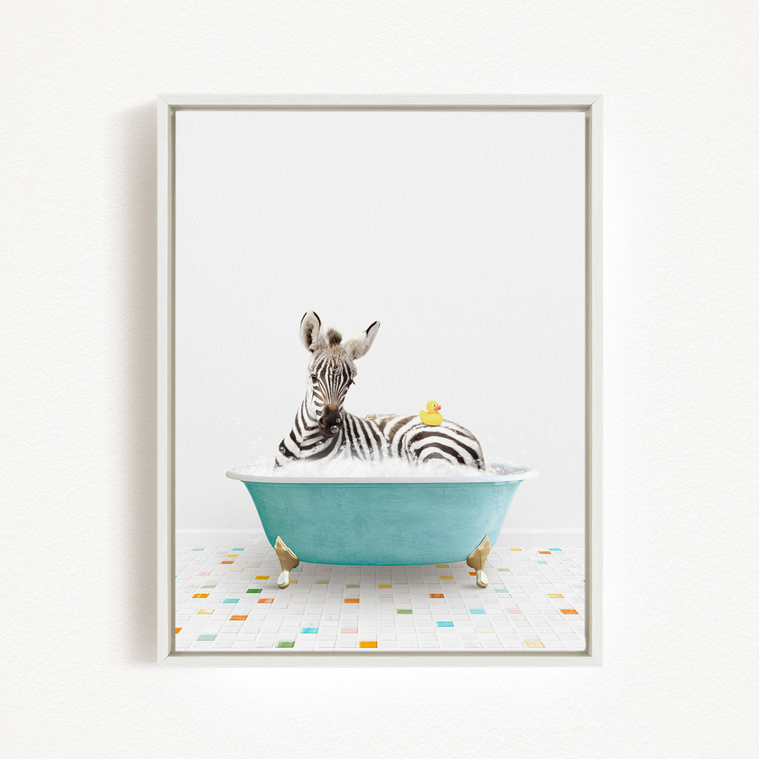 A zebra is sitting in a blue bathtub filled with water, with a rubber duck floating on its back.